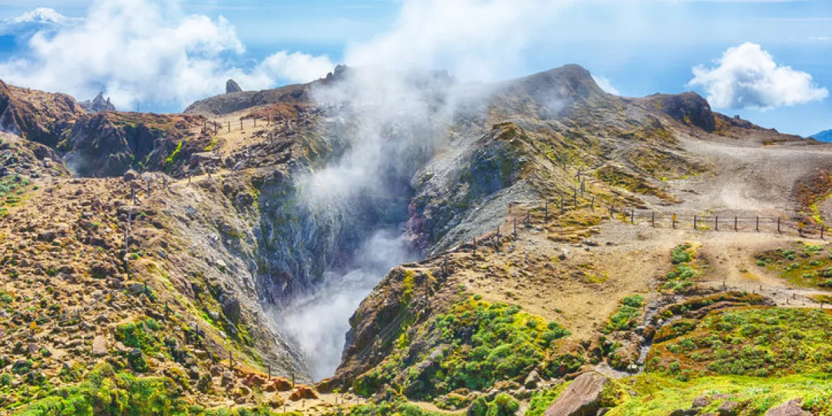 steam rising from the crater la soufriere volcano the highest mountain in guadeloupe, french department in caribbean