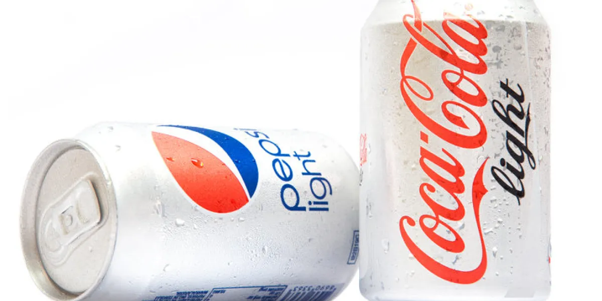 istanbul, turkey - september 18, 2012  aluminum cans of pepsi light and coca-cola light in the 1980s and 1990s, coke and pepsi engaged in the cola wars  competitive marketing campaigns and numerous product rollouts aimed at outselling the other