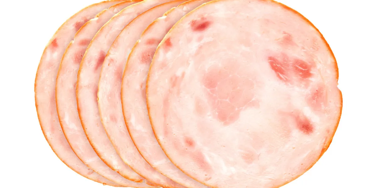 slices of smoked ham or sausage isolated on white, top view slices of smoked ham or sausage isolated on white, top view