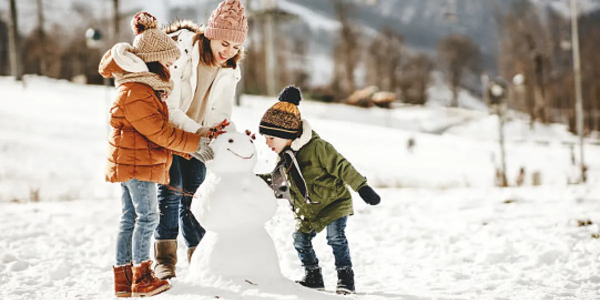 happy family mother and children daughter and son having fun on winter walk happy family mother and children daughter and son having fun on winter walk