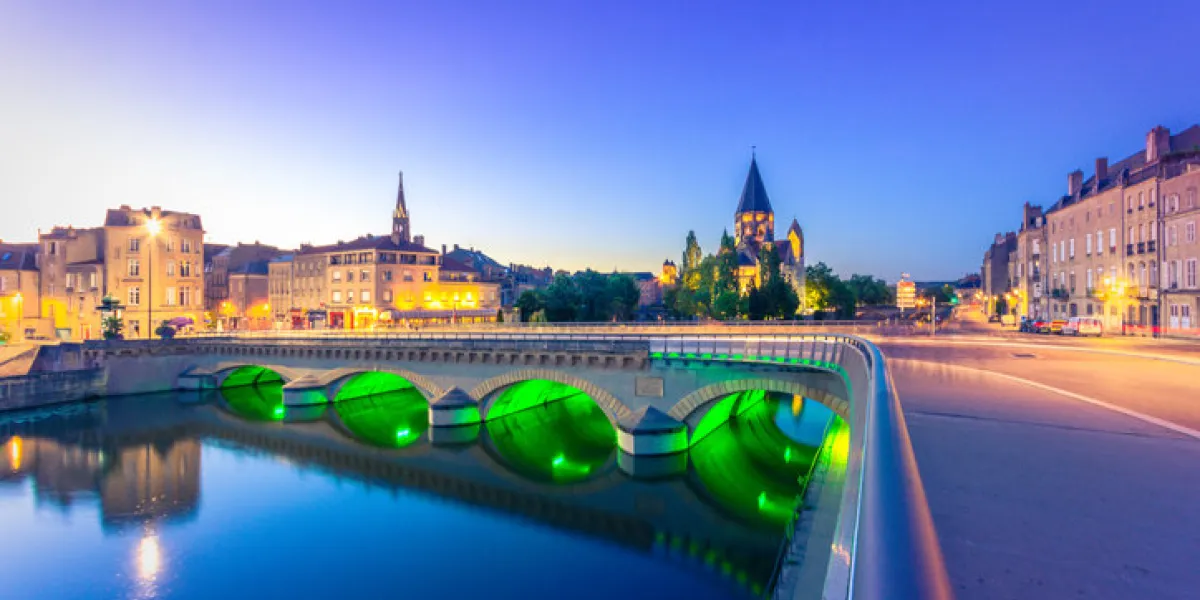 view of metz with temple neuf reflected in the moselle river, lorraine, france view of metz with temple neuf reflected in the moselle river, lorraine, france