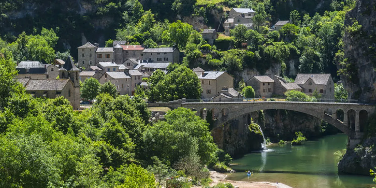 gorges du tarn (lozere, linguedoc-roussillon, france), famous canyon at summer village, bridge and canoes gorges du tarn (lozere, linguedoc-roussillon, france), famous canyon at summer village, bridge and canoes