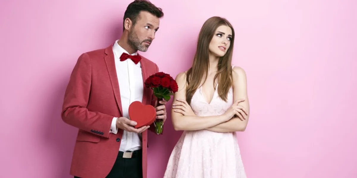 man with bunch of rose and chocolate box apologizing fiance man with bunch of rose and chocolate box apologizing fiance