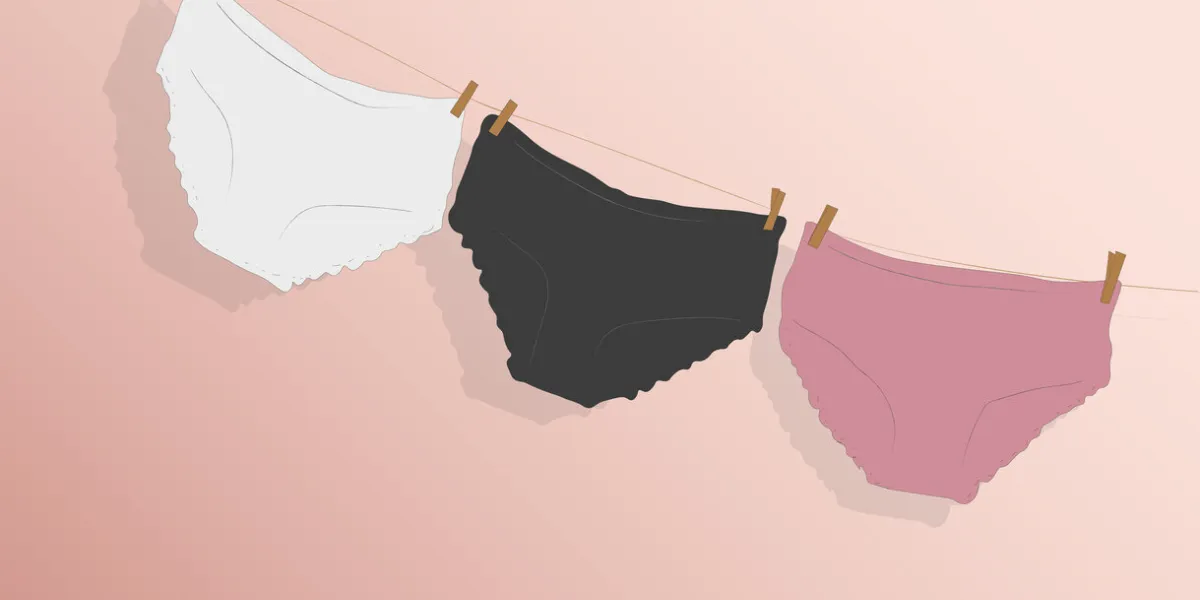 colorful clean women's panties hang on a rope on a pink isolated background vector illustration