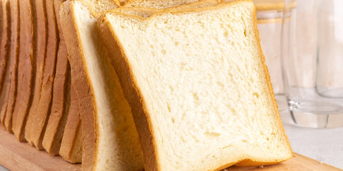 stack of slice bread isolated on bright background close up stack of slice bread isolated on bright background close up