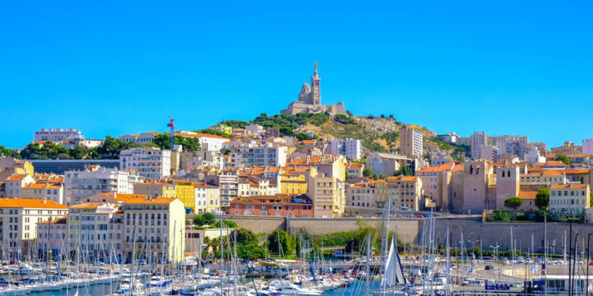 marseille embankment with yachts and boats in the old port and notre dame de la garde, vieux-port de marseille