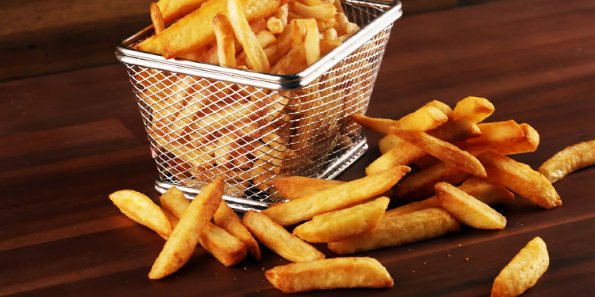 tasty french fries on wooden table background fresh pommes frites