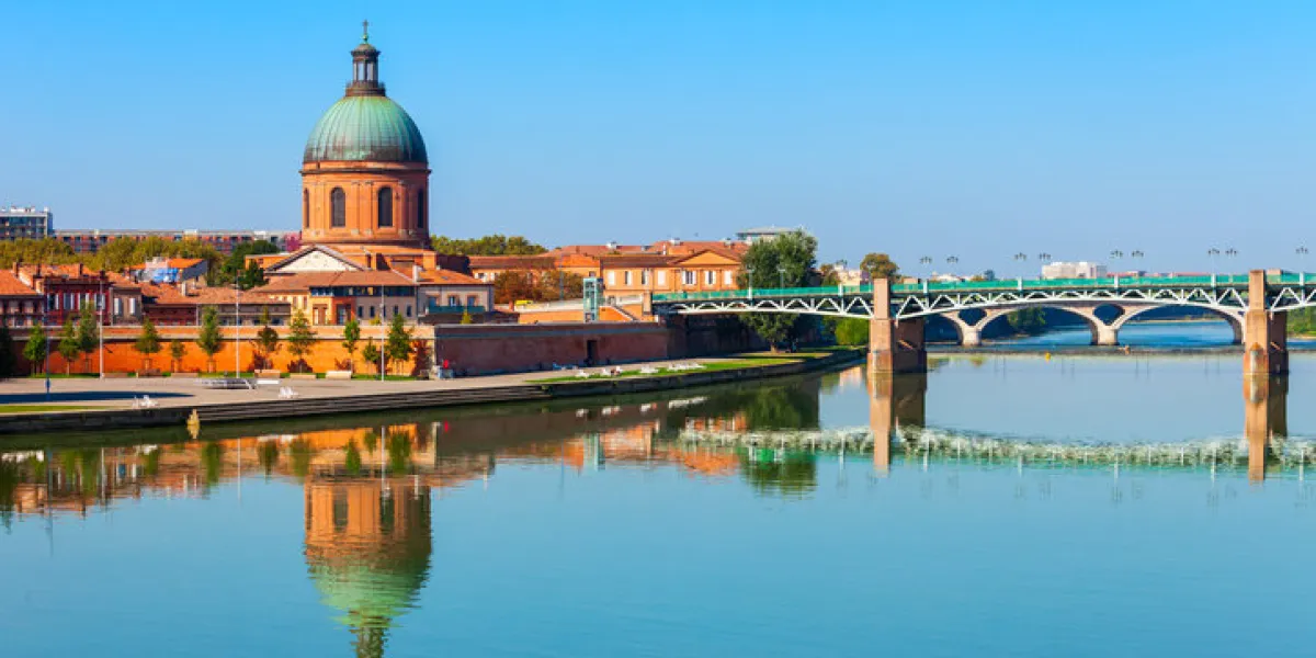 chapel of hospital saint joseph de la grave and garonne river embankment in toulouse city in france