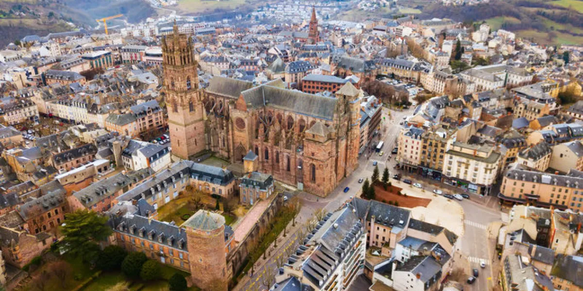 aerial view of residential houses and ancient historical buildings of french city of rodez in winter day