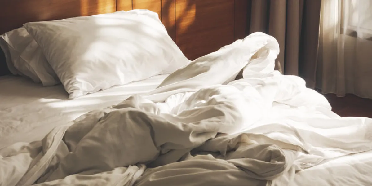 bed mattress pillows duvet unmade bedroom morning with sunlight bedroom home interior