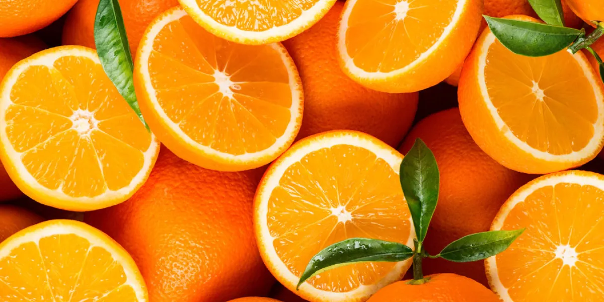 top view of freshly harvested fruits of orange tree with green leaves organic oranges top view of freshly harvested fruits of orange tree with green leaves organic oranges