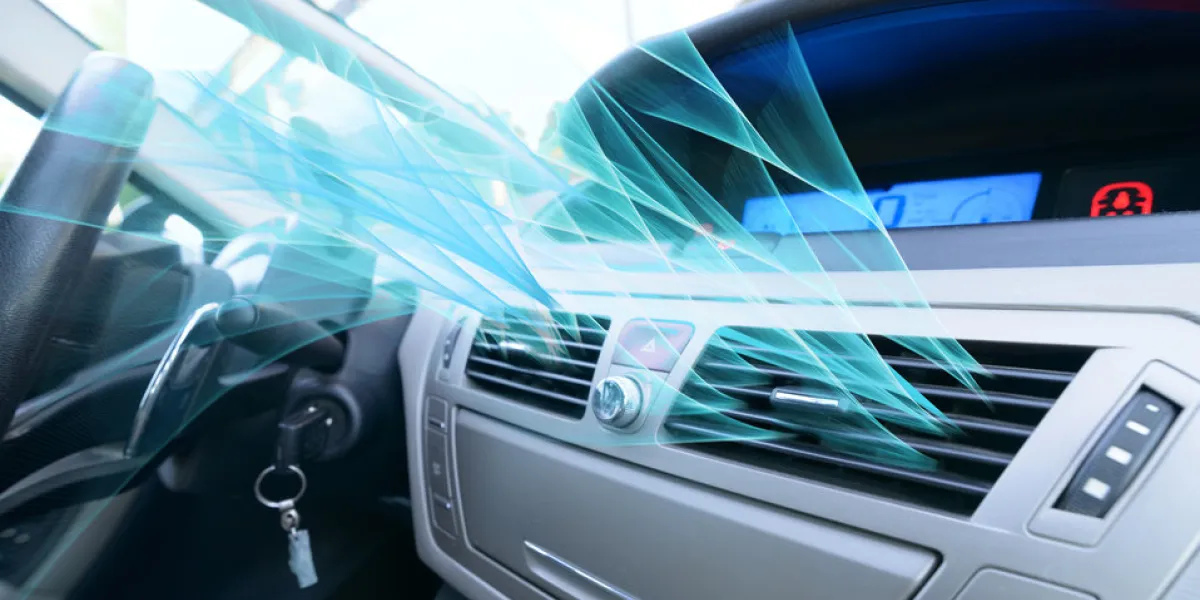 driver hand tuning air ventilation grille, fresh air is coming out driver hand tuning air ventilation grille, fresh air is coming out