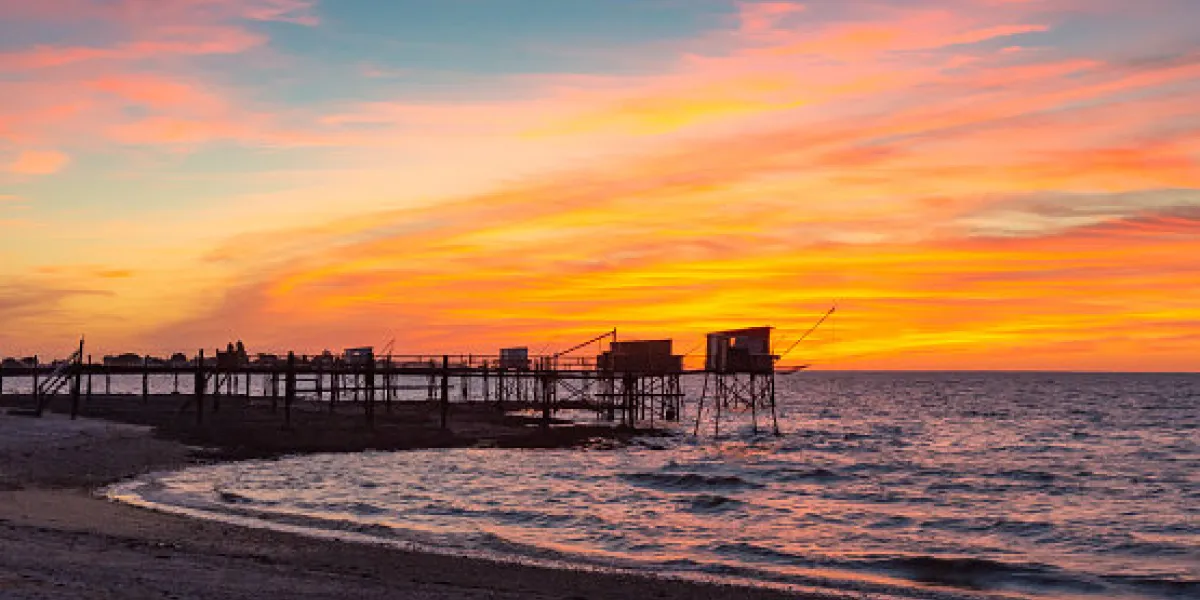 carrelet fishing huts on stilts at sunset near la rochelle france