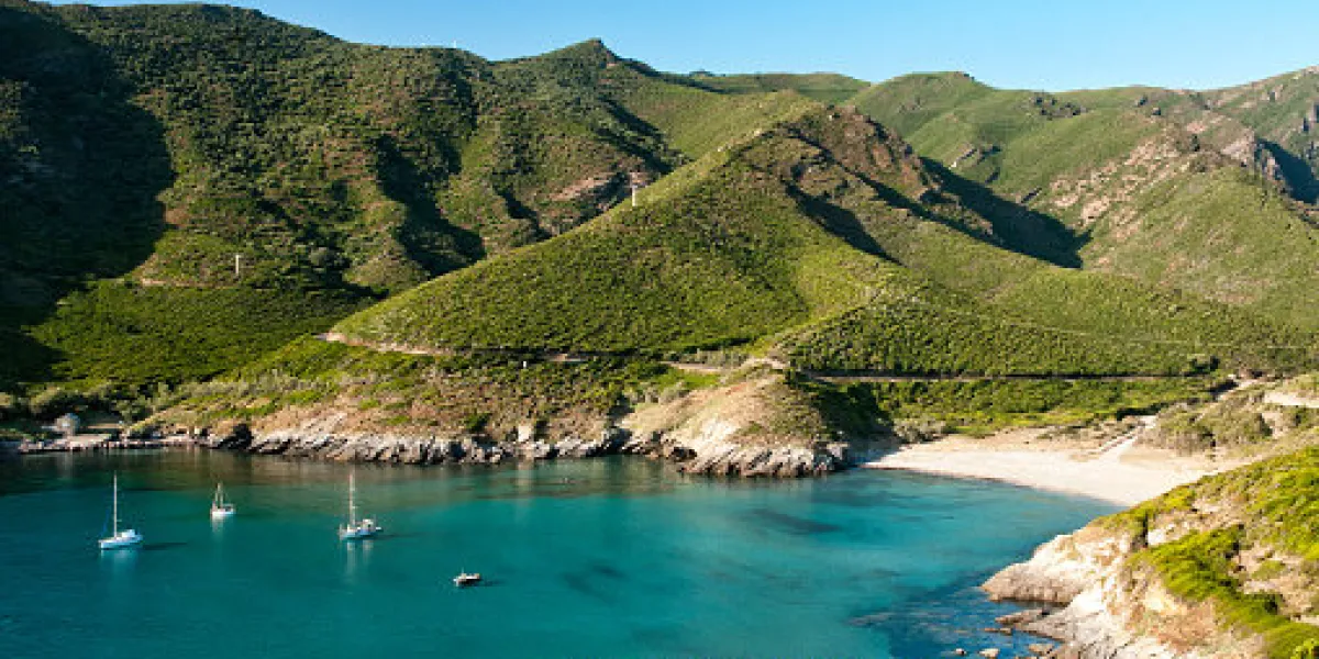 beautiful view on anse d’aliso (plage d’alisu) one of the most remote beaches of the western side of cap corse, the northern peninsula of the corsica island famous for its wild landscape near pino, morsiglia, luri, centuri
