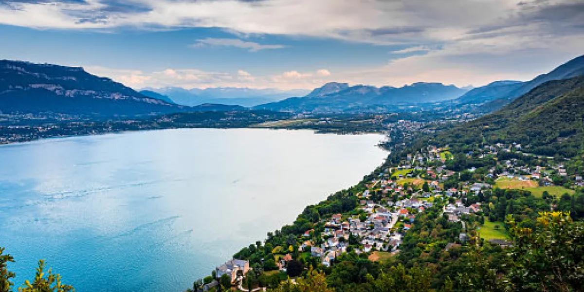 elevated viewpoint over small french village of bourdeau on the edge of lake bourget near aix les bains and chambery city in alps mountains