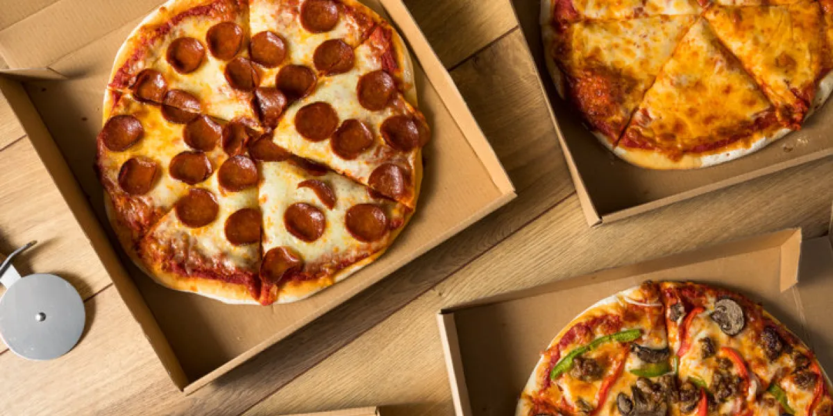 take out pizza in a box ready to eat