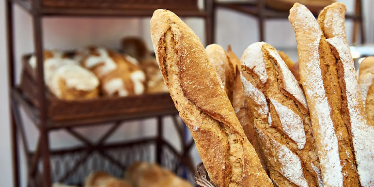 bread baguettes in a basket in the baking shop bread baguettes in a basket in the baking shop