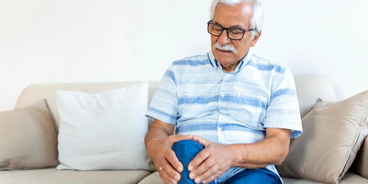 homme douleur genou