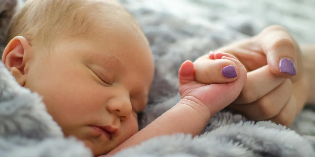 newborn baby boy holding moms hand newborn baby boy holding moms hand