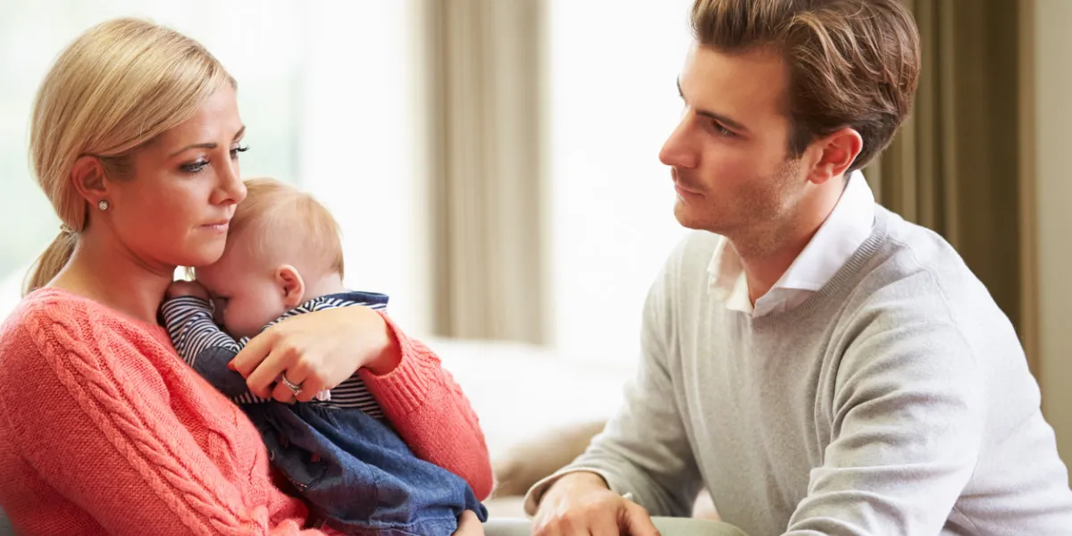 white british couple with woman suffering from post natal depression