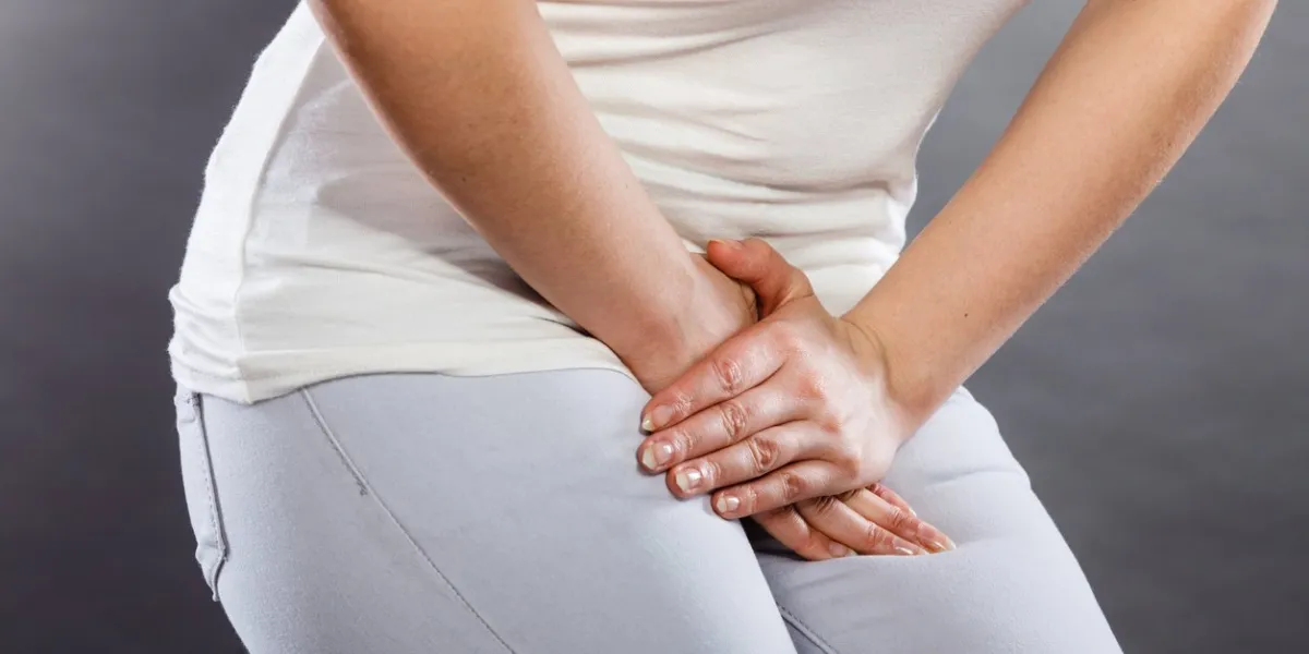 young sick woman with hands holding pressing her crotch lower abdomen medical or gynecological problems, healthcare concept young sick woman with hands holding pressing her crotch lower abdomen medical or gynecological problems, healthcare concept
