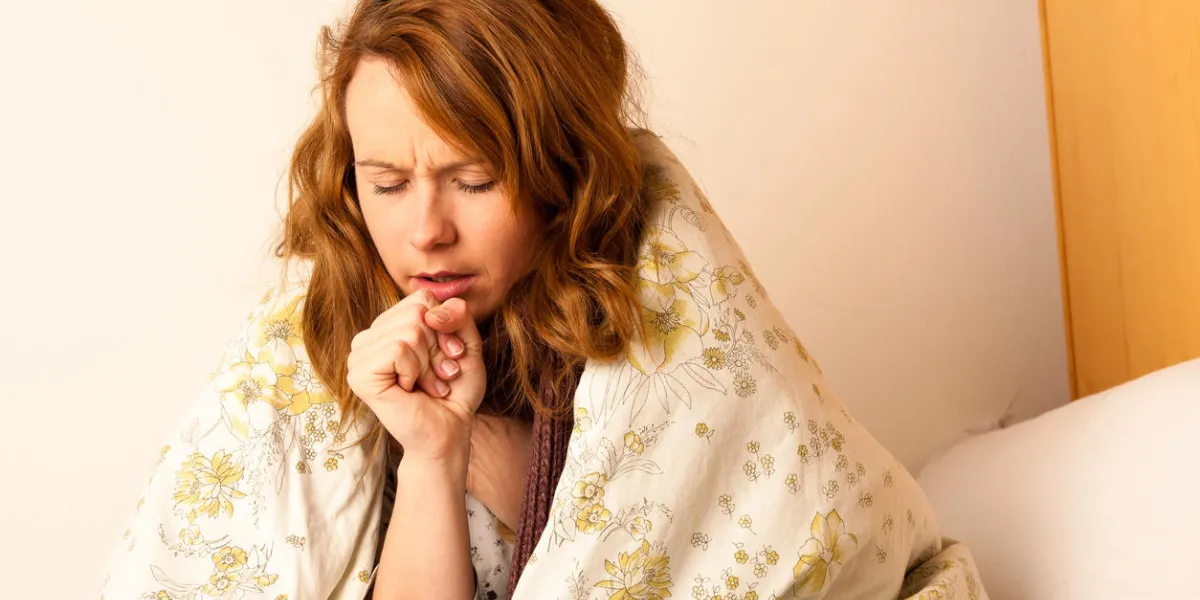 sick woman cough in ved under blanket sick woman cough in ved under blanket