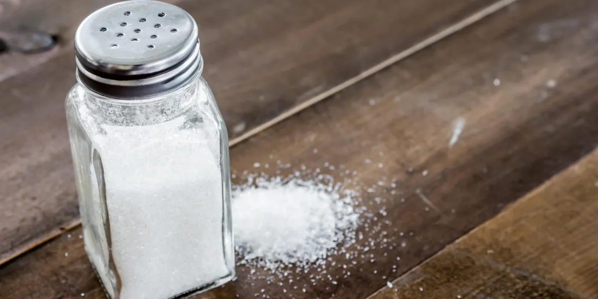 salt in wooden table