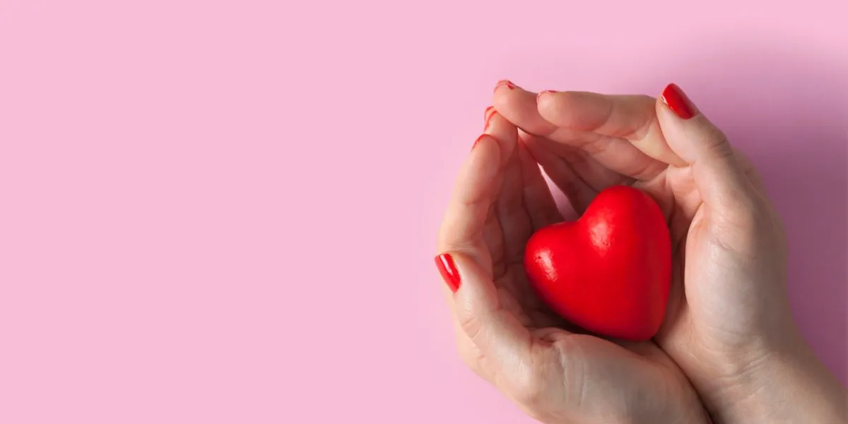 woman hands holding red heart, health care, donate and family insurance concept, world heart day, world health day, valentine's day concepts woman hands holding red heart, health care, donate and family insurance concept, world heart day, world health day, valentine's day concepts