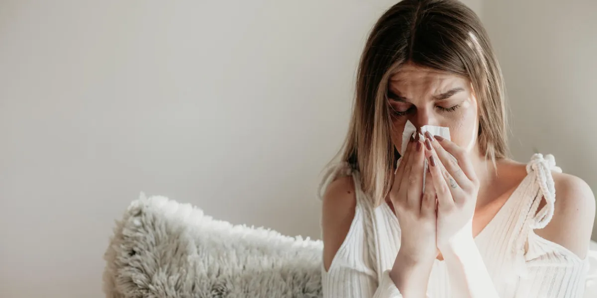 portrait of a young woman dealing with season allergies