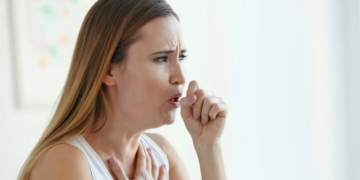 young woman with allergy at home
