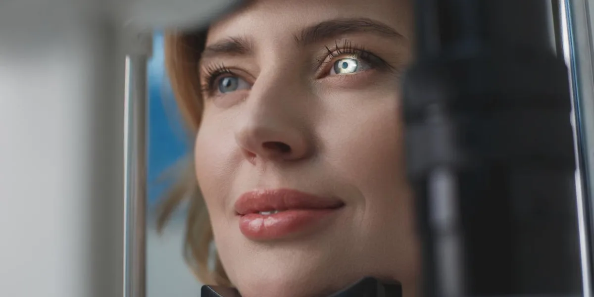 close up beaming woman face inspecting eyes in ophthalmological center medicine concept close up beaming woman face inspecting eyes in ophthalmological center medicine concept