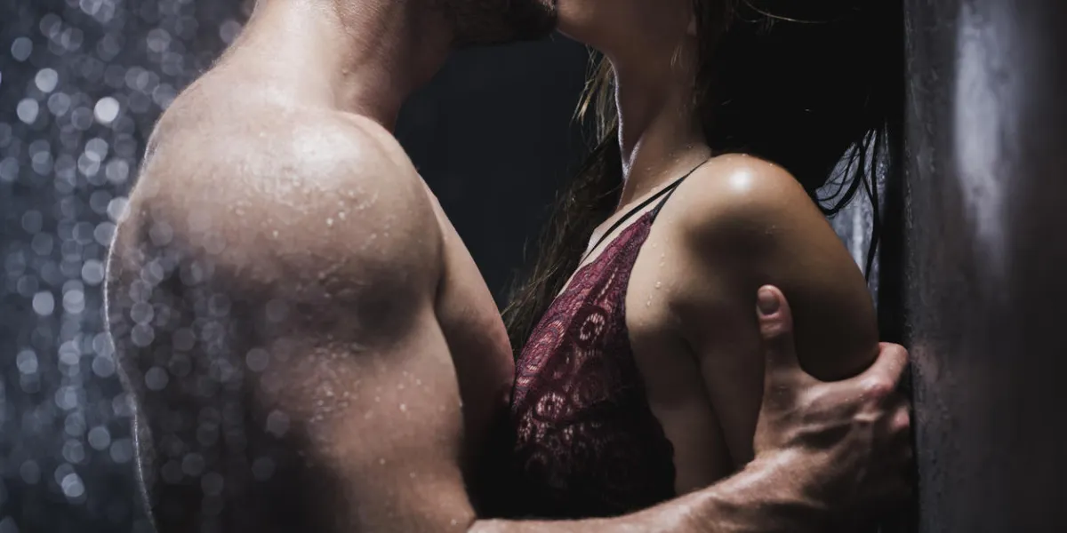undressed couple kissing passionately in the shower undressed couple kissing passionately in the shower