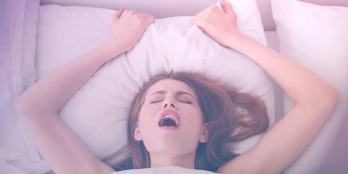 beautiful woman getting sexual satisfaction in bed beautiful woman getting sexual satisfaction in bed