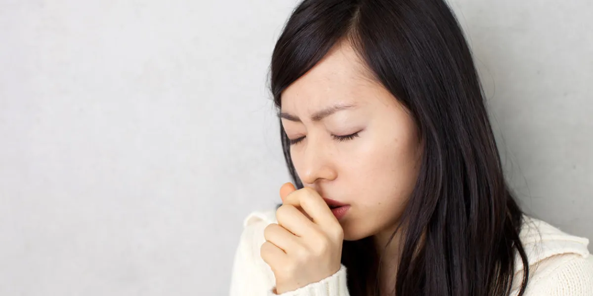 woman coughing