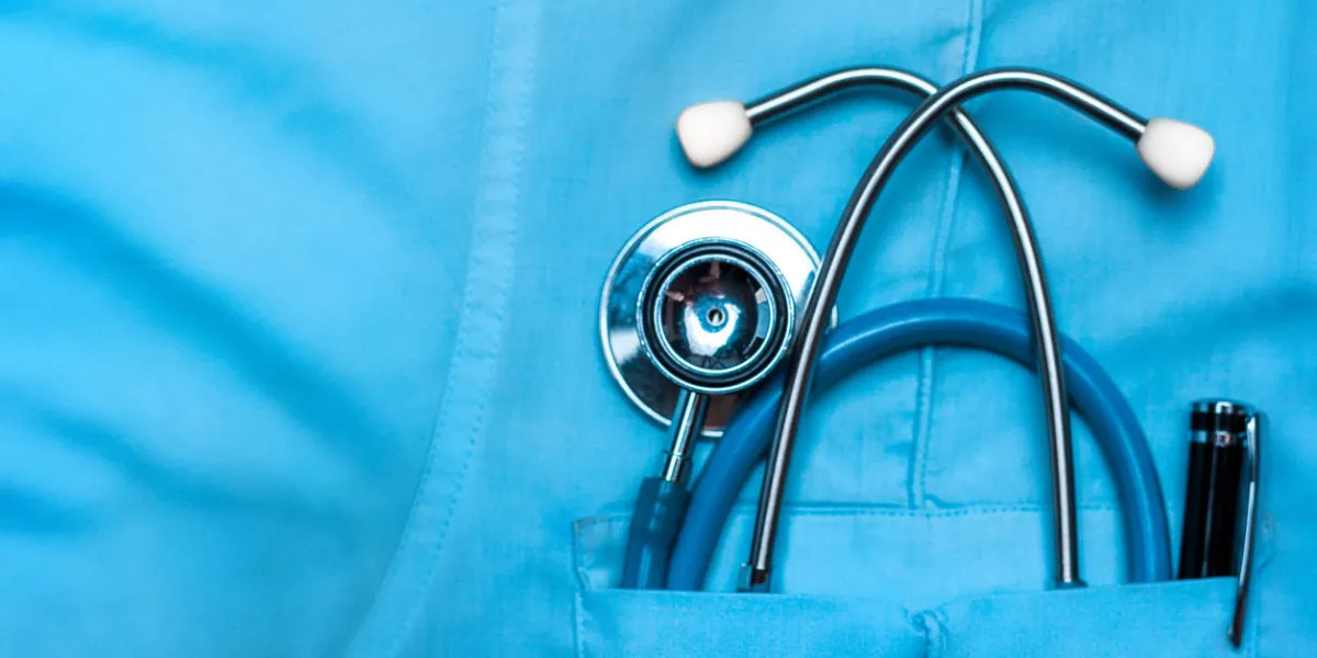 stethoscope and pen in doctor robe pocket concept of the global healthcare, medicine and insurance stethoscope and pen in doctor robe pocket concept of the global healthcare, medicine and insurance
