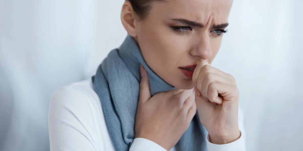 cold and flu portrait of beautiful young female with cough and sore throat feeling sick indoors closeup of ill unhealthy woman in scarf coughing, caught cold health care concept high resolution cold and flu portrait of beautiful young female with cough and sore throat feeling sick indoors closeup of ill unhealthy woman in scarf coughing, caught cold health care concept high resolution