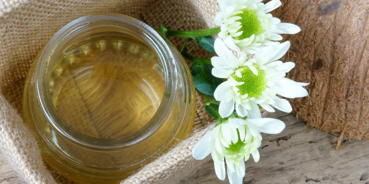 coconut oil, essential oil from nature, a skin care that safe, rich vintamin, use in massage at spa, organic cosmetic on wooden background coconut oil, essential oil from nature, a skin care that safe, rich vintamin, use in massage at spa, organic cosmetic on wooden background