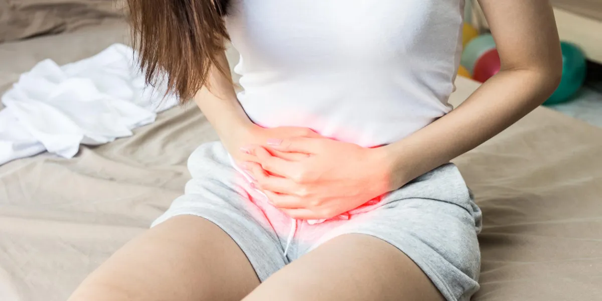 woman have bladder pain sitting on bed in bedroom after wake up feeling so illness,healthcare concept woman have bladder pain sitting on bed in bedroom after wake up feeling so illness,healthcare concept