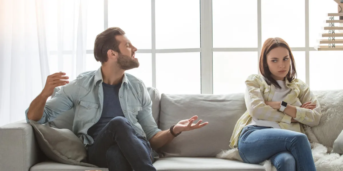 young woman and man family couple indoors quarrel young woman and man family couple indoors quarrel