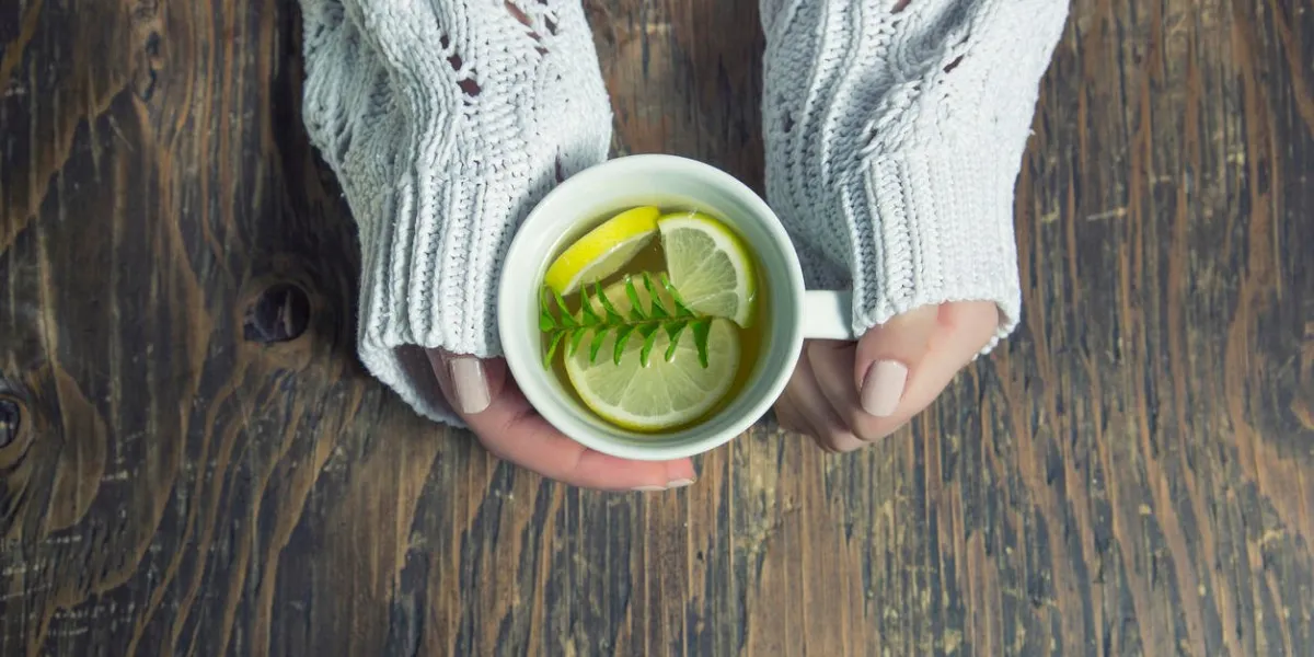 cup of tea with thyme herb and lemon slices cup of tea with thyme herb and lemon slices