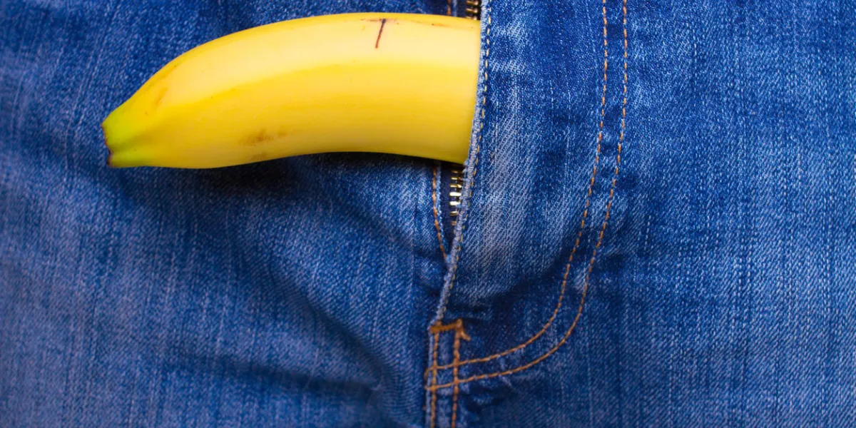 banana out of mens jeans like mens penis potency concept banana out of mens jeans like mens penis potency concept