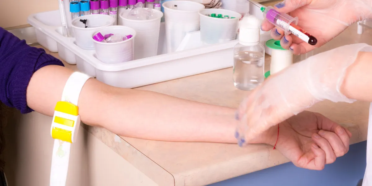 nurse holding injection and take a blood sample nurse holding injection and take a blood sample