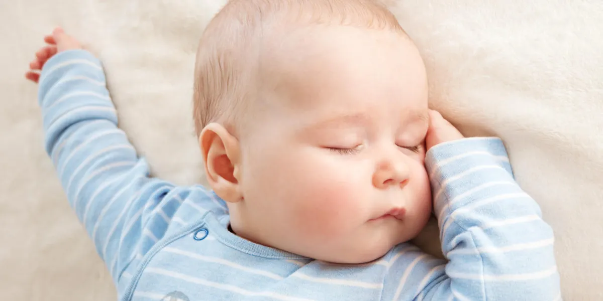 little boy sleeping on soft white blanket little boy sleeping on soft white blanket