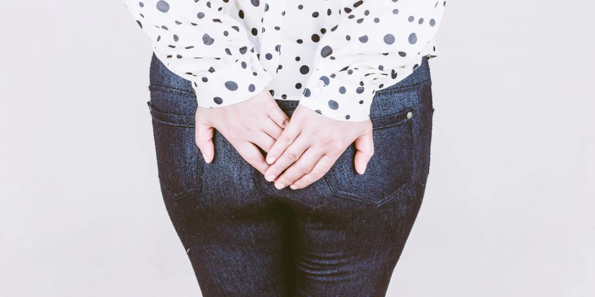 woman has diarrhea holding her butt woman has diarrhea holding her butt