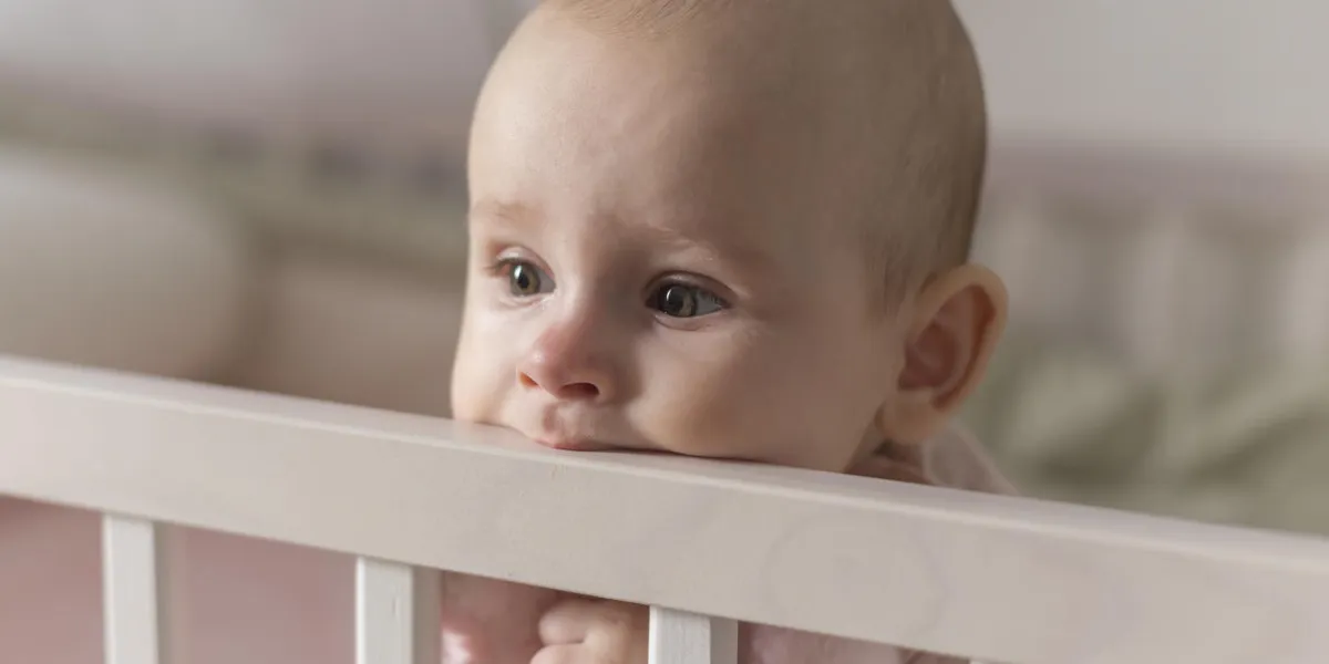 first teeth grow a baby, pain and biting