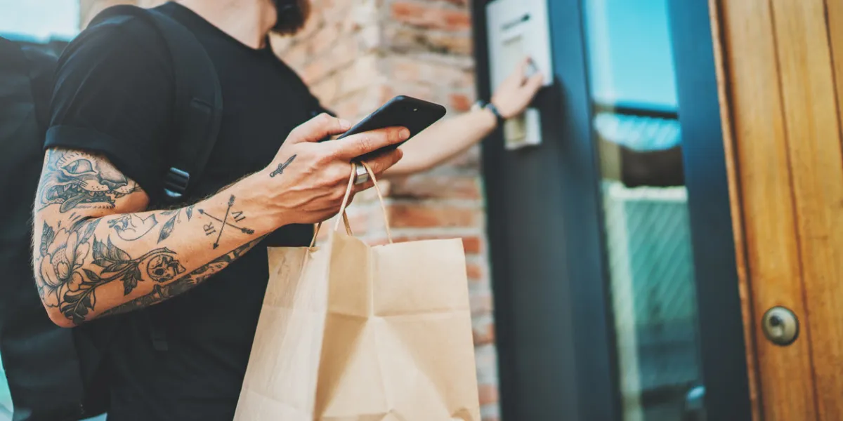 courier delivery food service at home man courier delivered the order no name bag with food courier delivery food service at home man courier delivered the order no name bag with food