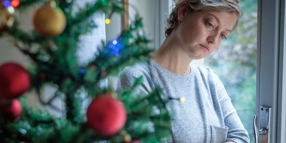 woman feeling depressed during christmas days woman feeling depressed during christmas days