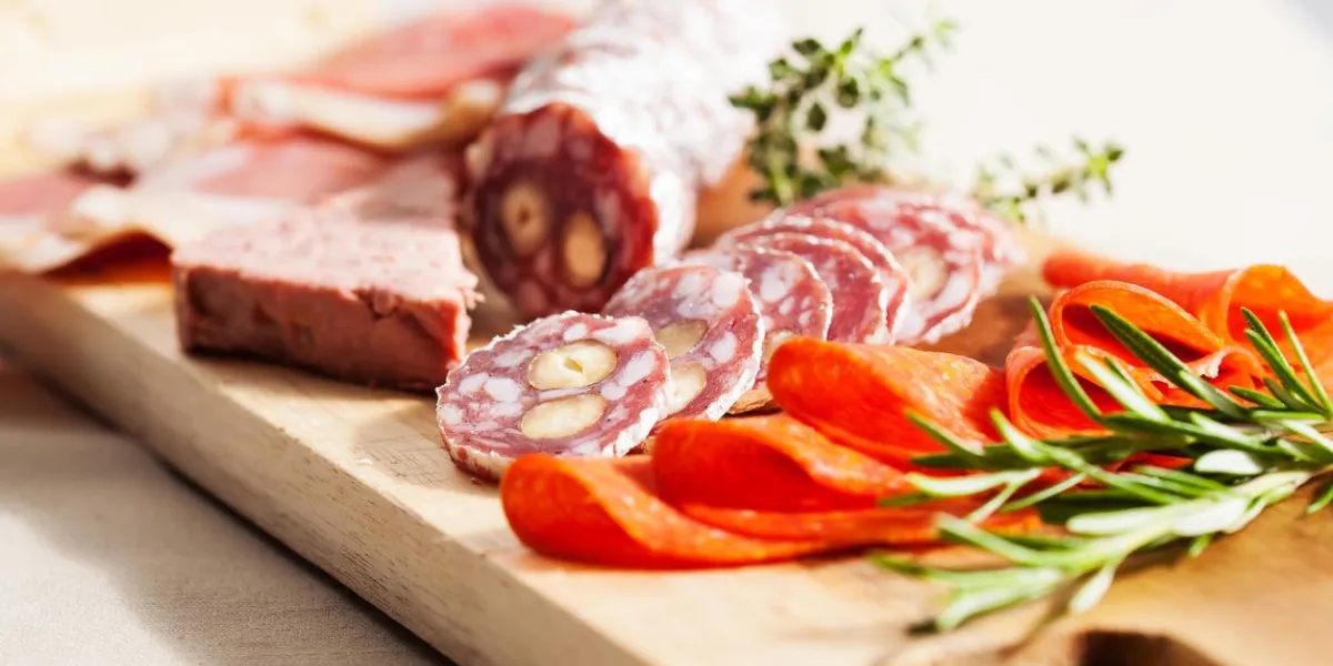 charcuterie assortment and cheese on wooden board charcuterie assortment and cheese on wooden board