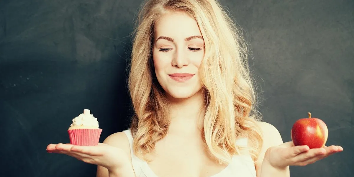 woman with healthy and unhealthy food difficult choice overweight concept woman with healthy and unhealthy food difficult choice overweight concept