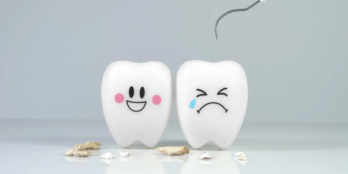 teeth smile and crying emotion with dental plaque tool ,concept dental care cleaning bacterial plaque teeth smile and crying emotion with dental plaque tool ,concept dental care cleaning bacterial plaque